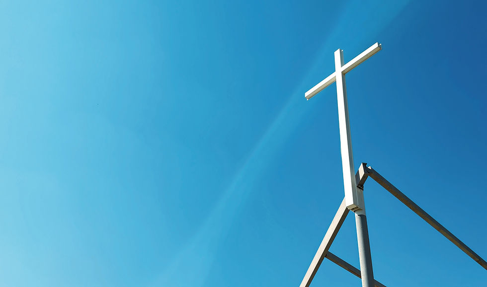 a cross on top of a metal structure_edited_edited.jpg