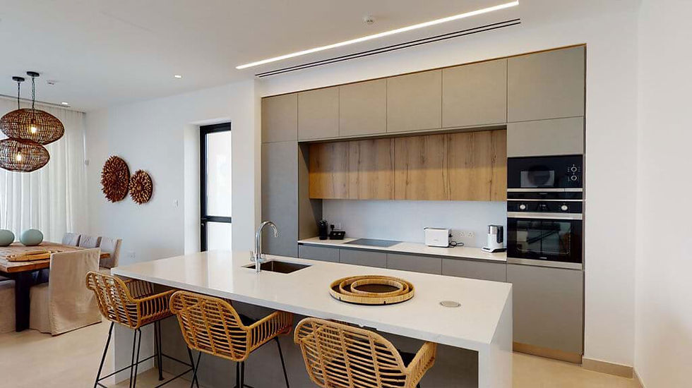 River flowing through a forest with mountains in the background