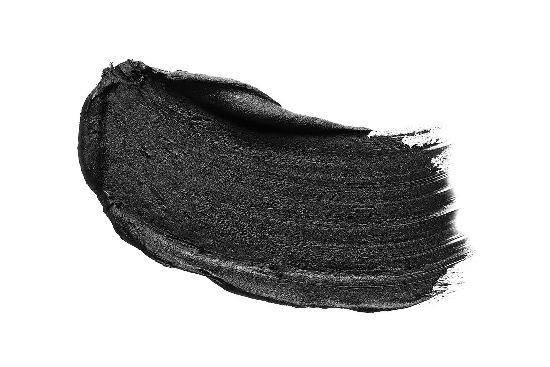 Texture of black crushed eyeliner or black acrylic paint isolated on white background.jpg