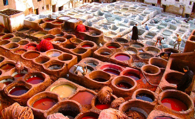 Colors in clay tanks with pigments at Fes medina tannery