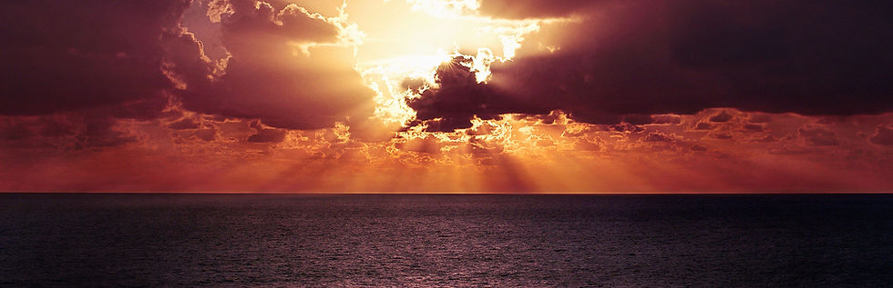 Blazing-red-sunset-rays-ocean-.jpeg