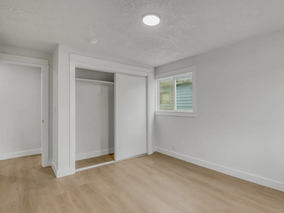 Fresh modern interior repaint with clean white finishes and millwork in Portland Oregon