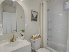 Modern bathroom remodel with fresh white interior paint and updated finishes in Portland Oregon