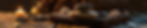 large-group-of-candles-on-wooden-table.jpg
