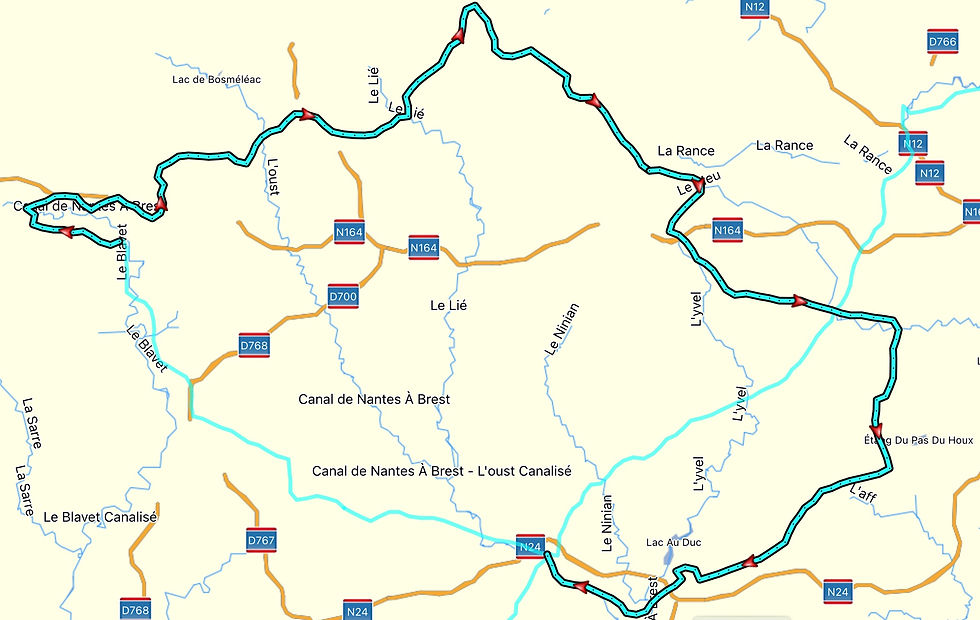 Map showing the Canal de Nantes à Brest with a highlighted route in blue. Roads labeled N164, D700, with surrounding rivers and landmarks. Our Day 5 route from Lake Guerledan back to beautiful Josselin…revisiting somewhere we wanted to explore…the benefits of a ‘No Plan Plan’. AvVida micro adventures. Life is an adventure / La vida es Una Aventura!