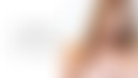 brunette woman with smokey eyes and pink lips with text "spray tan before your boudoir shoot?"