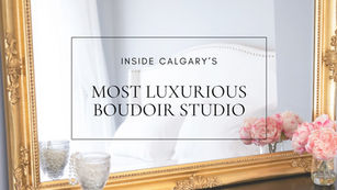 Gold mirror with pink roses reflecting a white bedroom at Boudoir by Laura Paige, featuring the text “Inside Calgary’s Most Luxurious Boudoir Studio.”