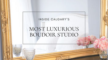 Gold mirror with pink roses reflecting a white bedroom at Boudoir by Laura Paige, featuring the text “Inside Calgary’s Most Luxurious Boudoir Studio.”