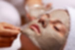 girl using clay mask