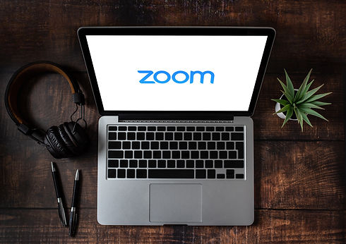 Alt="Mac laptop with Zoom on the screen"