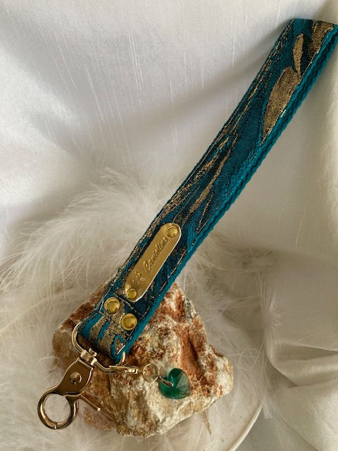 Asa de correa extraíble totalmente personalizable, así como la cuerda.