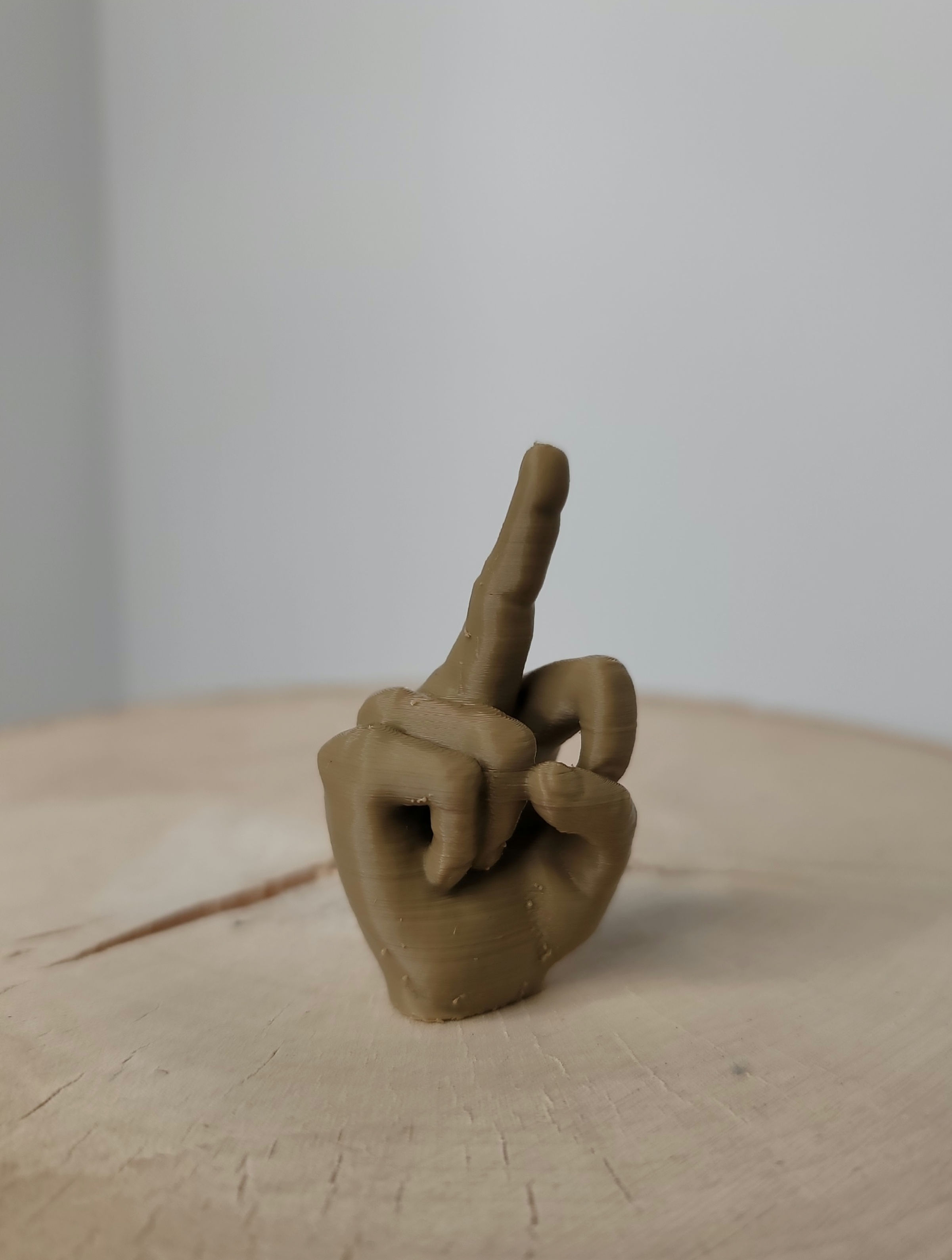 Dark Tan Middle Finger Valve Cap