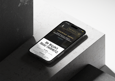 Mr Wilson's website shown on a mobile phone
