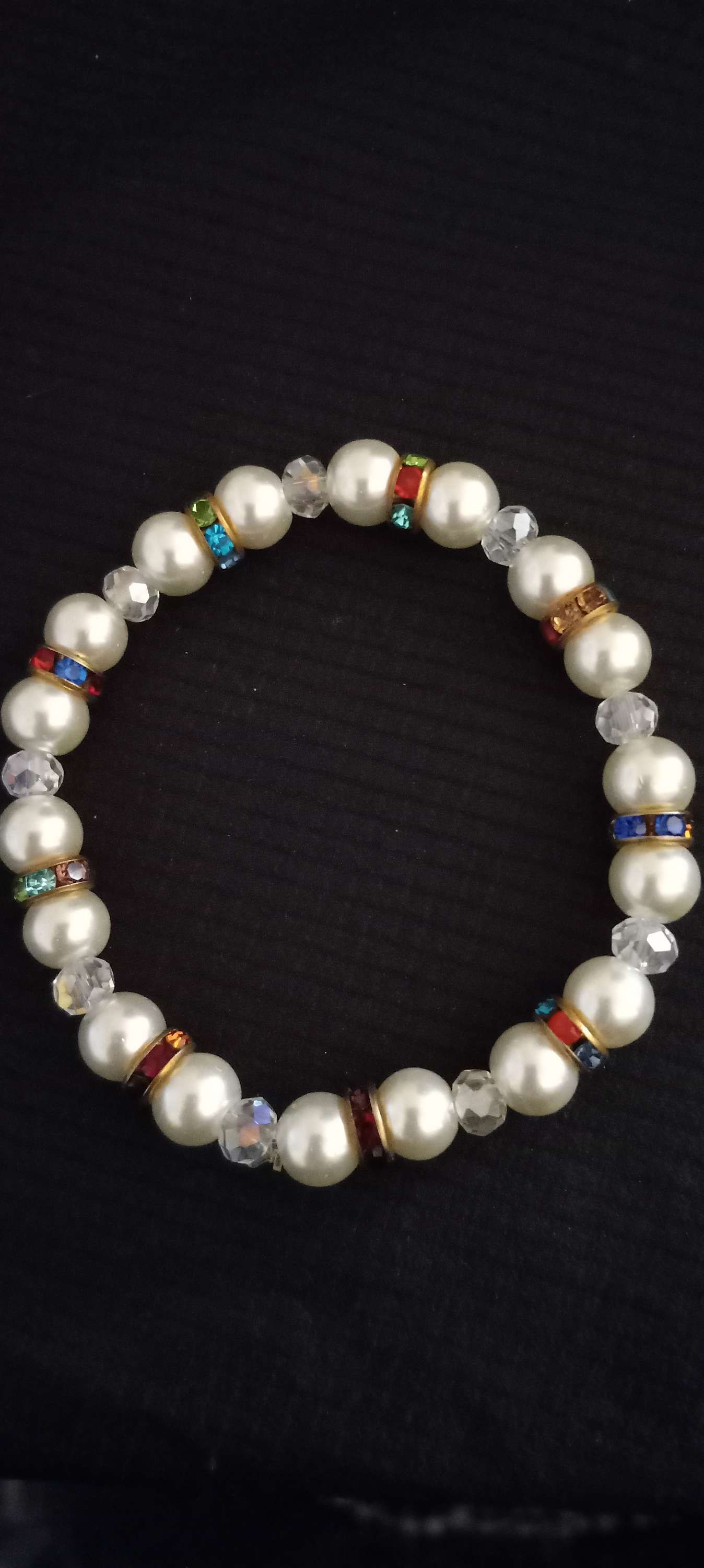 Pearl with multi colored spacers