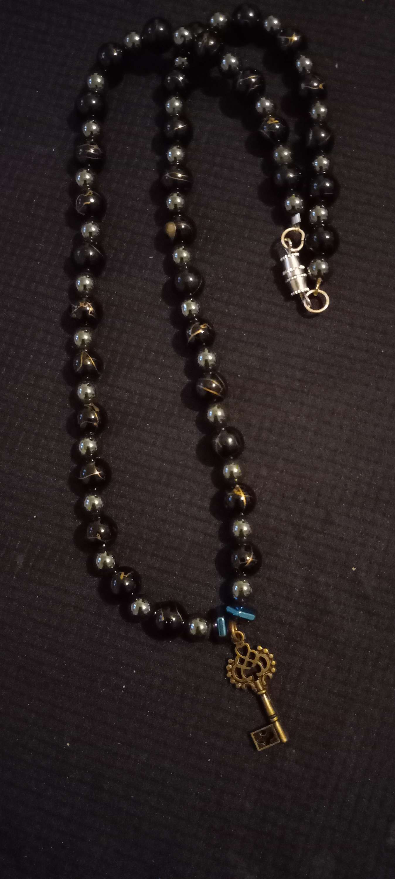 Golden key charm