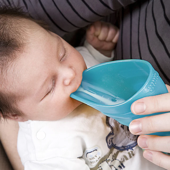 A baby being fed 