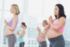 Pregnant women in yoga class