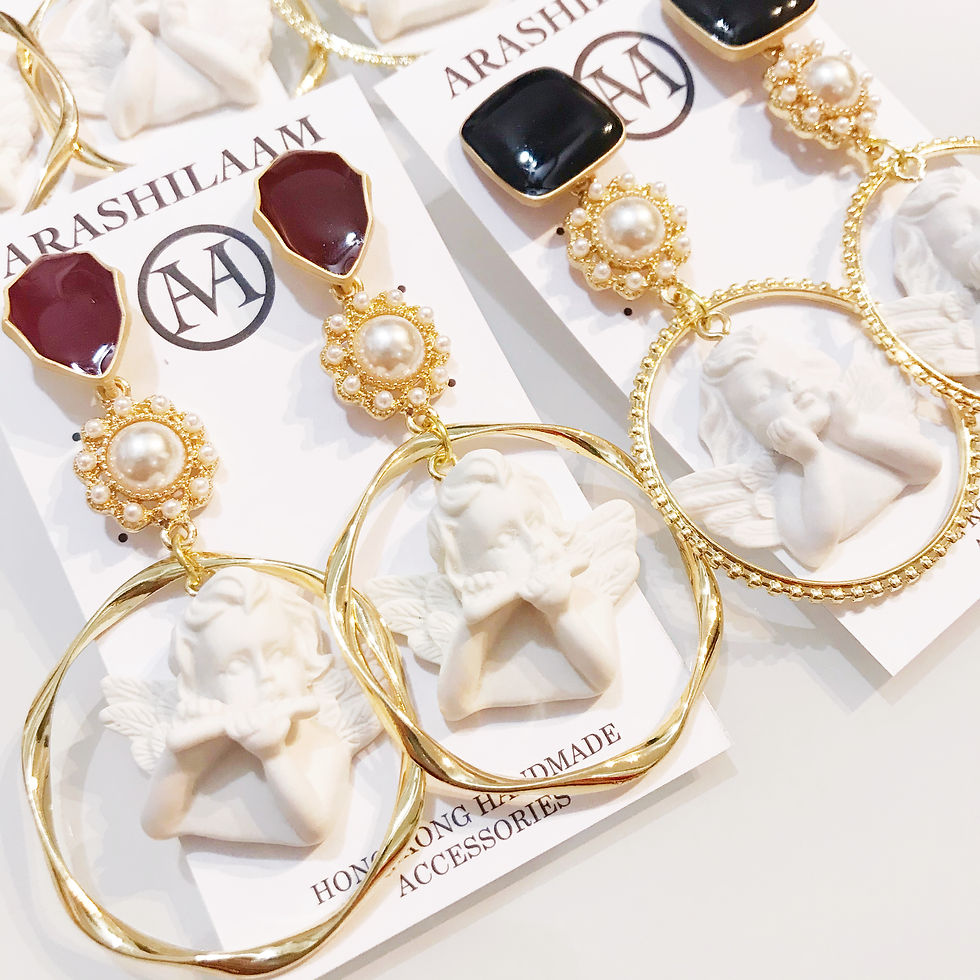 Thumbnail: Pearl Angel Rings