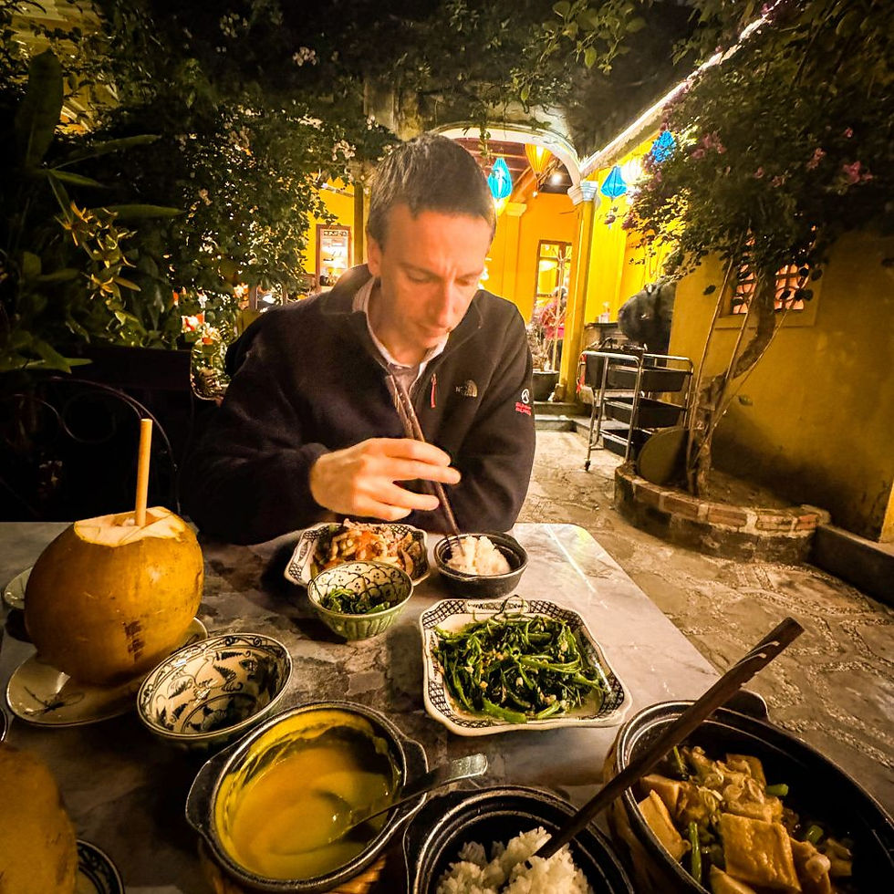 Things to do in Hoi An: A patio feast at Met Vietnamese Restaurant 6, where we ditched the beer and went full tropical with fresh coconuts — because sometimes hydration wins over hops.