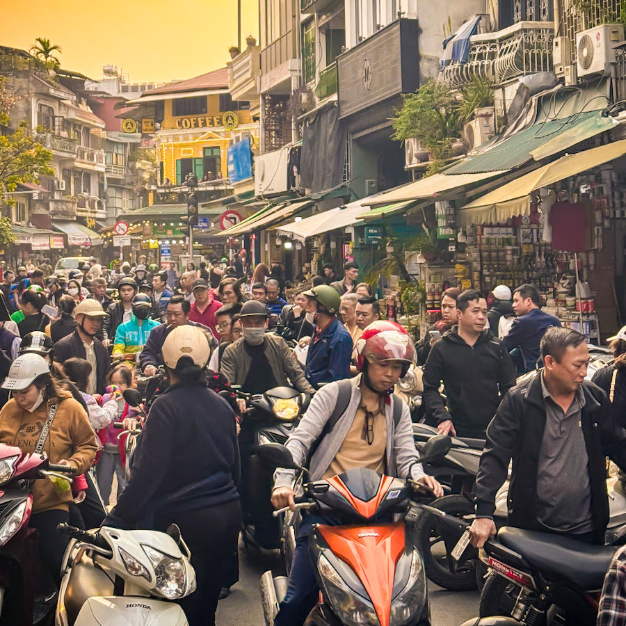 Complete motorbike chaos on a street in Hanoi’s Old Quarter.