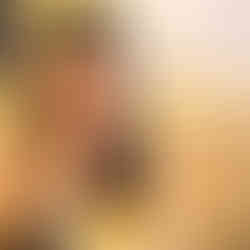 Shal tucking into a pastel de nata at Fabrica da Nata in Porto.