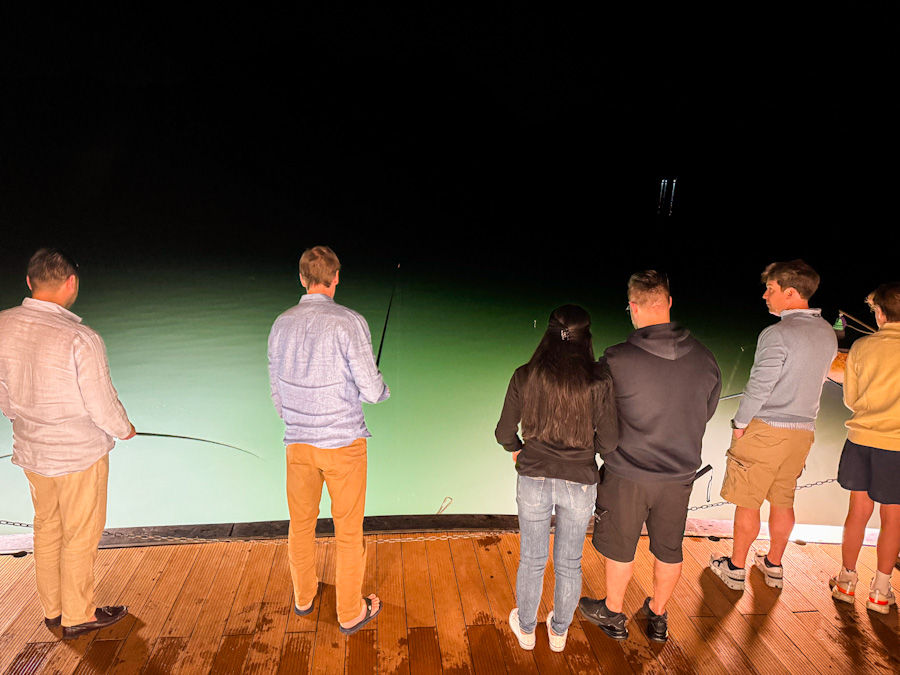 Guests on the 2 night Ha Long Bay cruise squid fishing: they cook what you catch — which for us was nada. But honestly, even James was still stuffed from our five-course feast of a dinner.