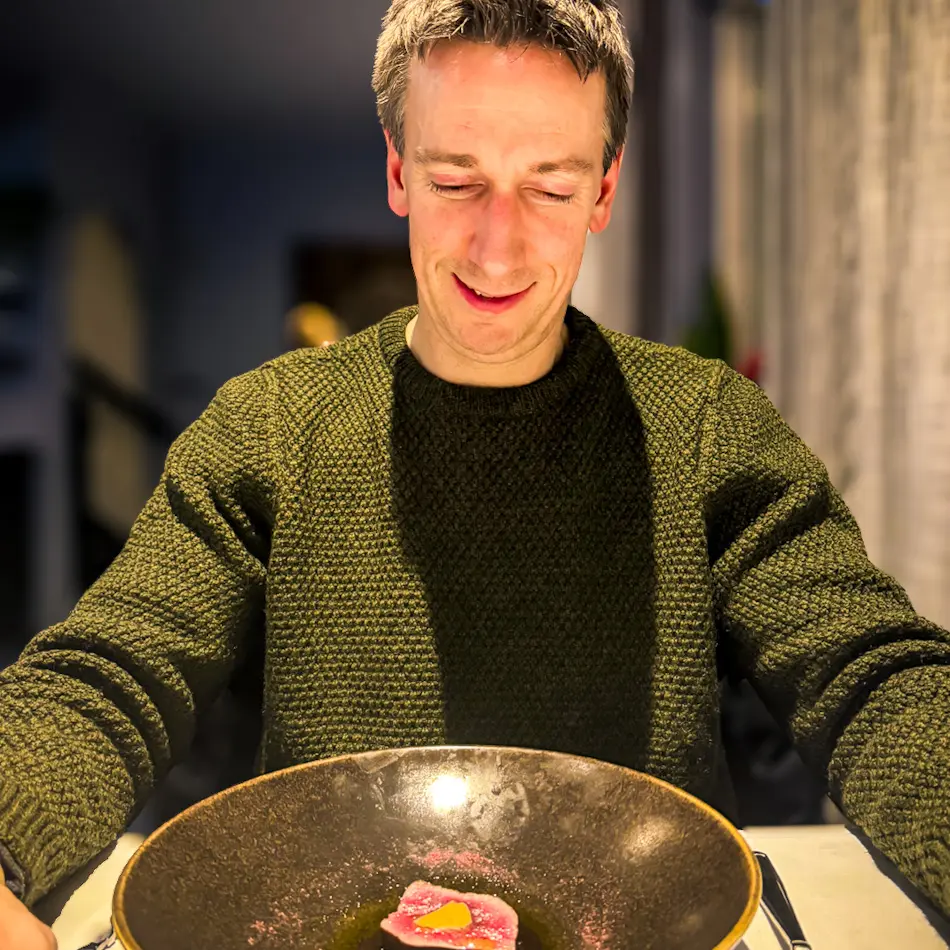 James enjoying the tasting menu at Emma’s Dream Kitchen restaurant during our Tromsø itinerary.
