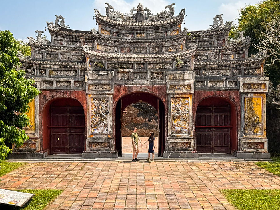 Hue day trip from Hoi An_The Mieu Gate inside Hue’s Forbidden City—one of the main entrances to the sacred ancestral halls, where every doorway feels like it’s guarding centuries of royal secrets and spiritual rituals.