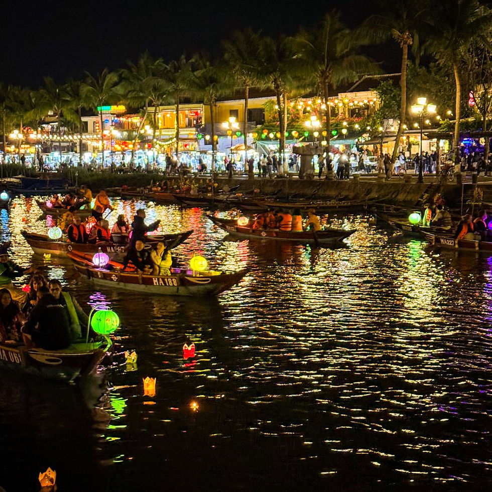 Things to do in Hoi An: Lanterns drifting, boats gliding, and the whole riverbank glowing like a scene from a dream — Hoi An’s Hoai River at night is pure magic (plus a little chaos, but the charming kind).