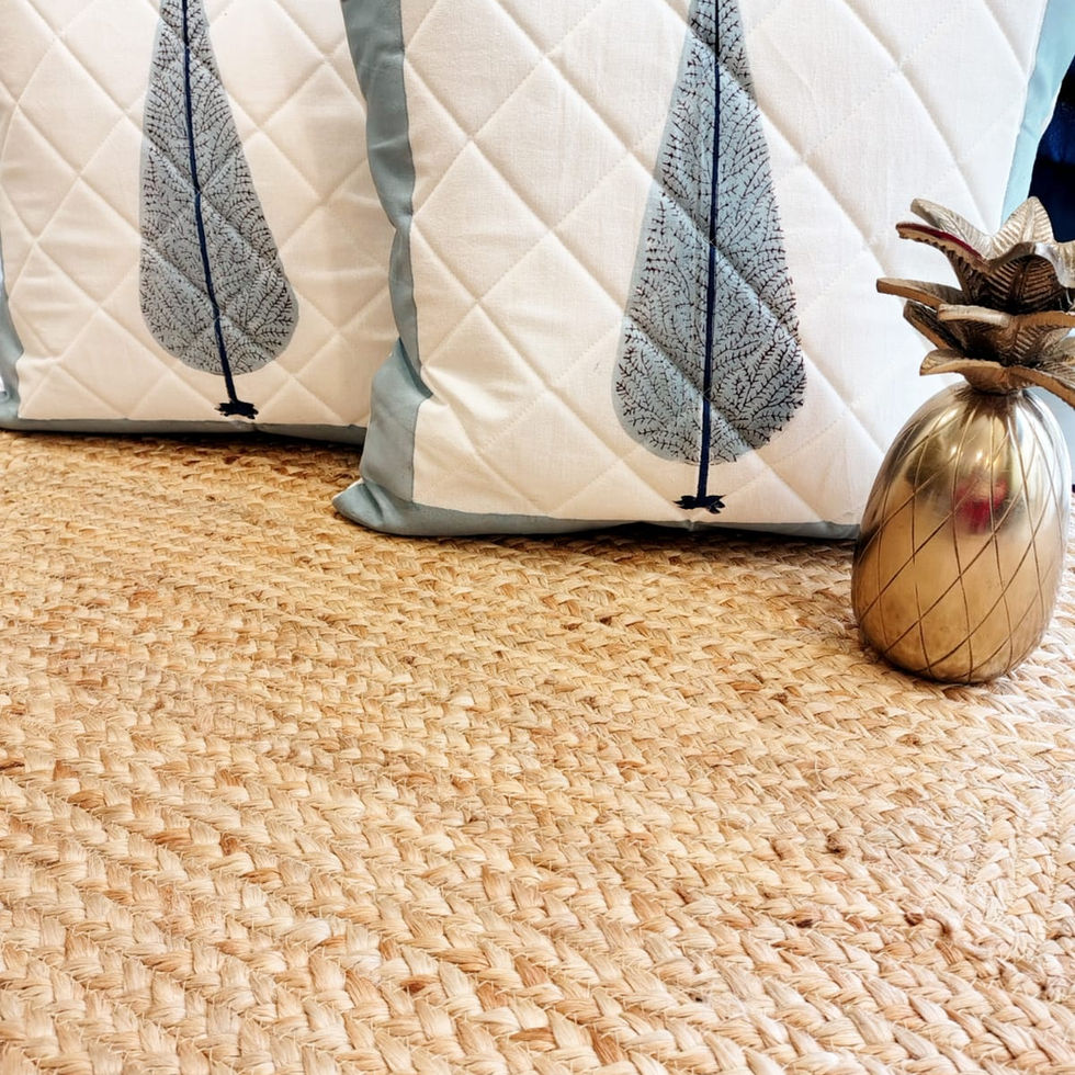 Handcrafted quilted cotton cushion covers with block-printed patterns and textured detailing.