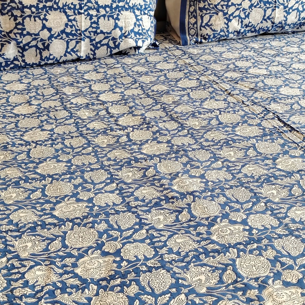 Hand block printed cotton bedsheet with botanical motifs in a serene, breathable design