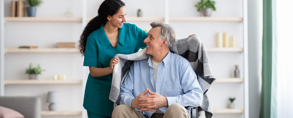 assisting-disabled-elderly-man-scaled.jpg