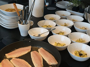 A photo showing dishes being prepared for the a private event