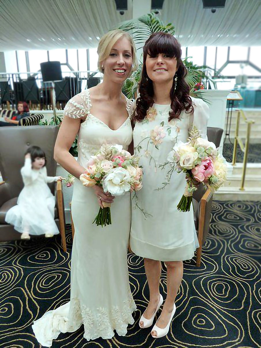 real bride in silk mermaid style wedding dress with embroidery and swarovski crystals