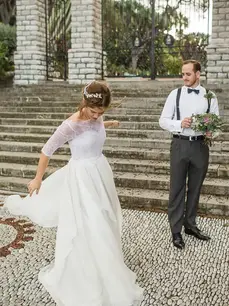 real bride wearing vegan wedding dress and lace top elopement