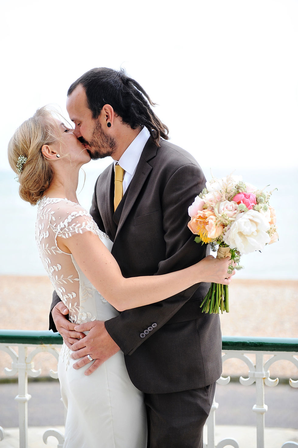 real couple wedding kiss bride in margo stankova luxury silk wedding gown