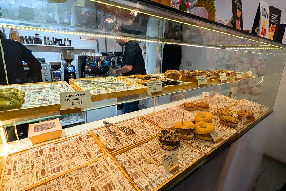 Sparse display case at Tokyo Bagel, showing high demand for their baked goods.