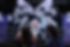Image: BTS fans take photos of BTS merchandise with a BTS banner displayed on the HYBE building in the background Photo: News1