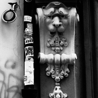 A pillar capital, stickers and graffiti, Prague
