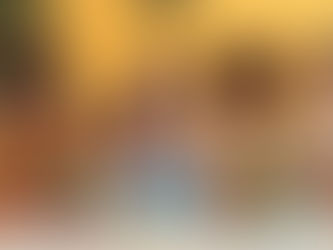 Children joyfully play with colorful toys on a cozy carpet. A decorated Christmas tree and gifts are in the background, creating a festive mood.