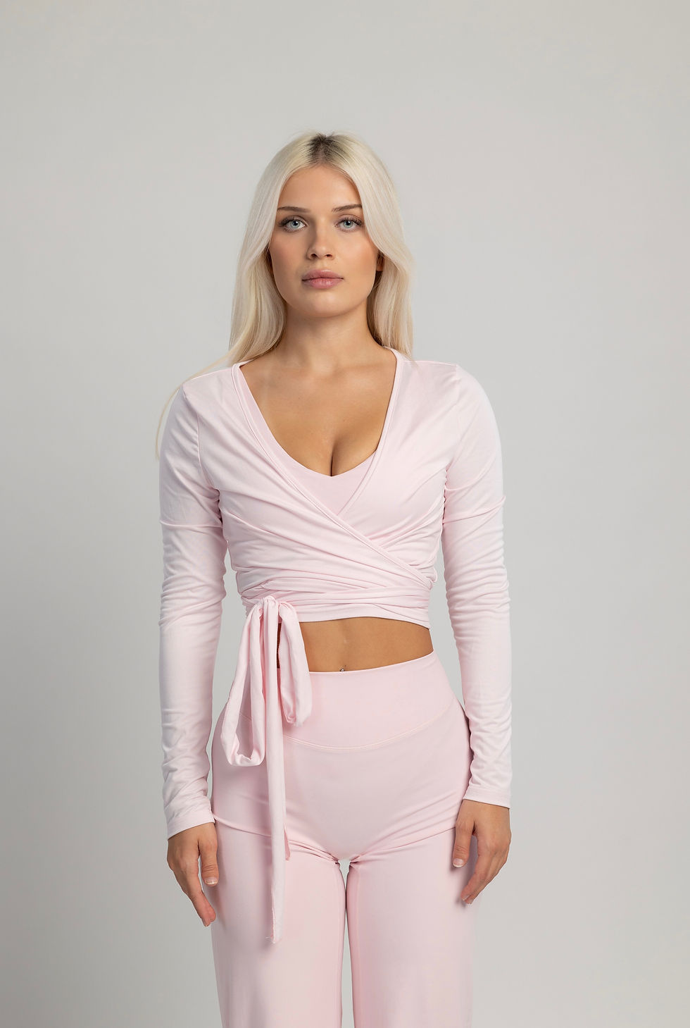 Thumbnail: Baby pink pilates wrap crop top