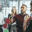 sticky-notes-glass-discussion-people-office-collaboration-employees-stock-market-brainstor