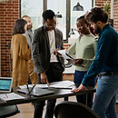 diverse-group-coworkers-planning-research-analysis-business-office-working-startup-partner