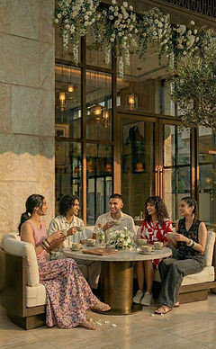 They_are_all_seated_around_the_table_in_order_of_u_delpmaspu (1).png