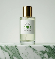 Perfume Bottle Sitting on Marble Tabletop