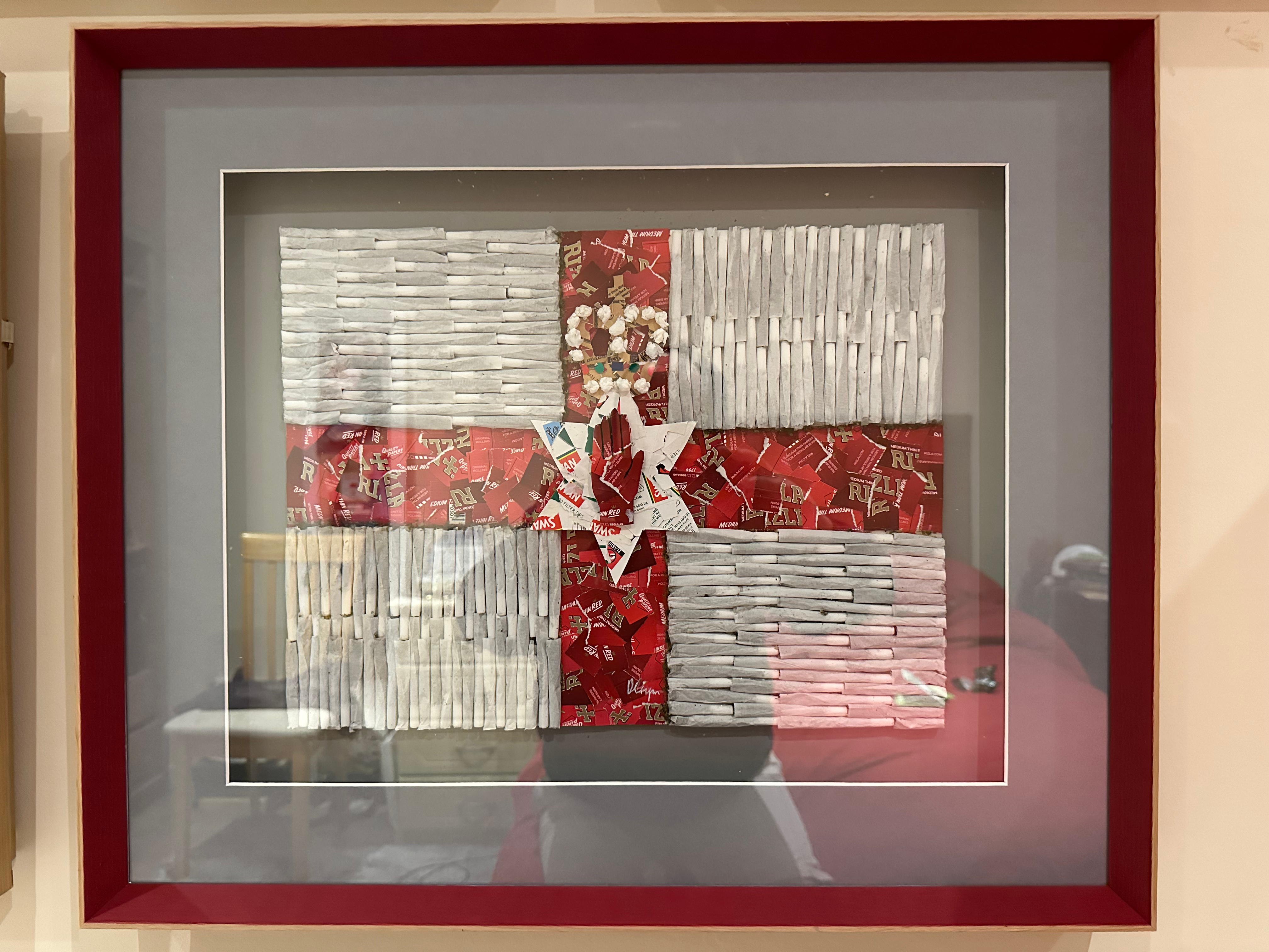 Combustible Identity original Northern Ireland flag collage in Rizla papers by Daniel Chapman