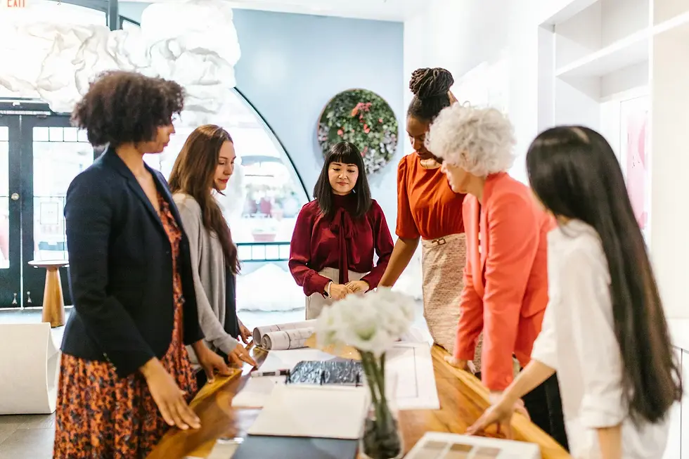 6 women working around a table