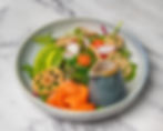Salmon Salad with seaweed, avocado, lotus root, tomatoes, and mixed greens
