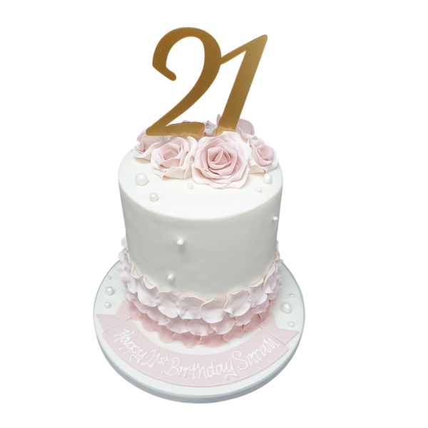 Bespoke petal cake adorned with edible pearls, crafted for celebration in Solihull, West Midlands.