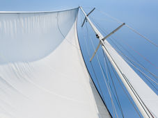 Genoa sail is hoisted on sailing boat mast.jpg